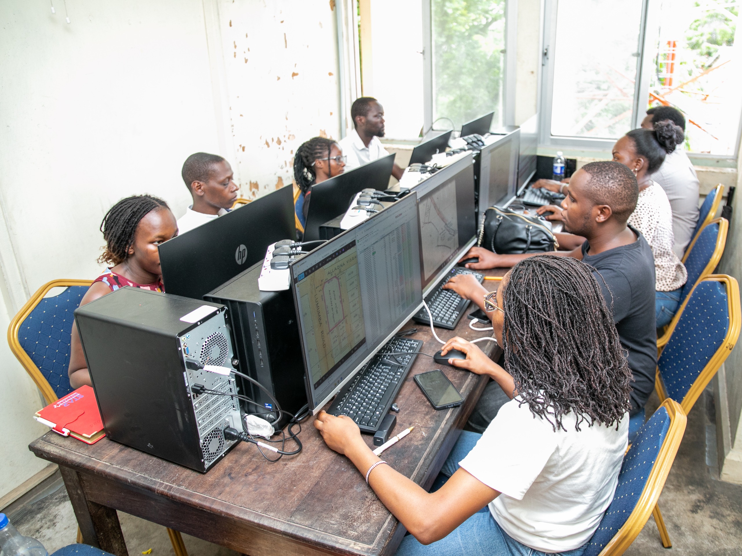 Officials from the State Department for Lands and Physical Planning carrying out the digitisation exercise in Mombasa Lands office.