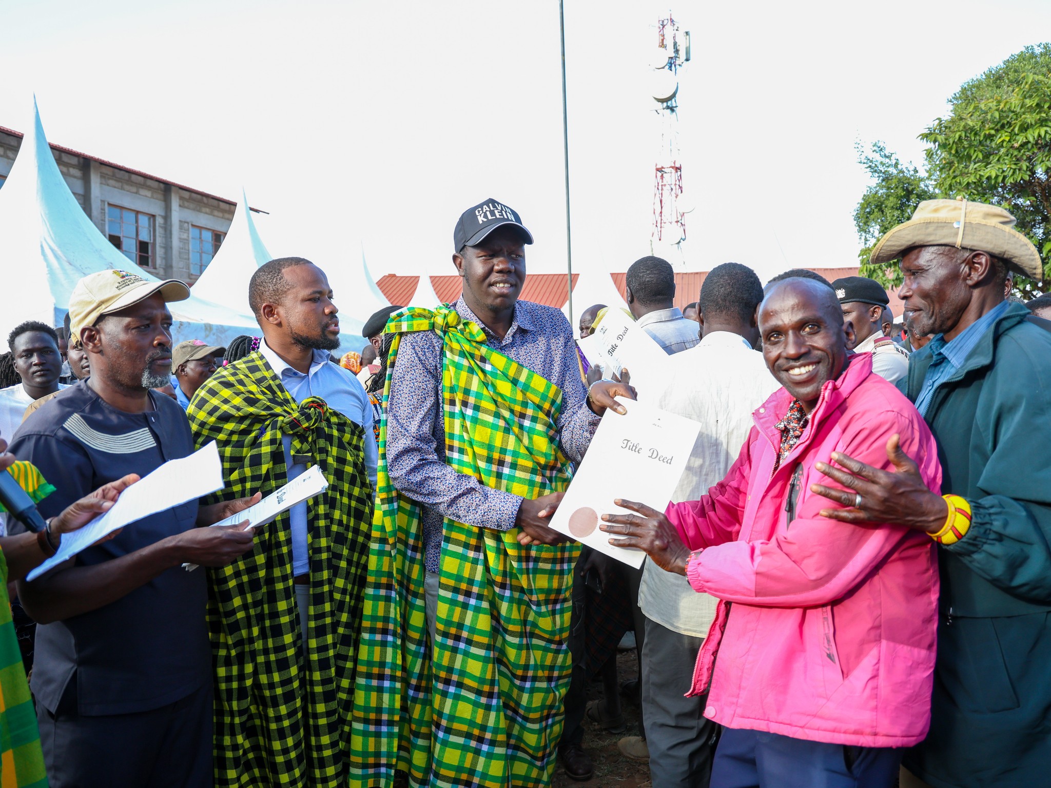 Mogotio MP Reuben Kiborek issues title deed to a resident of Churo/Amaya Ward in Tiaty Constituency.