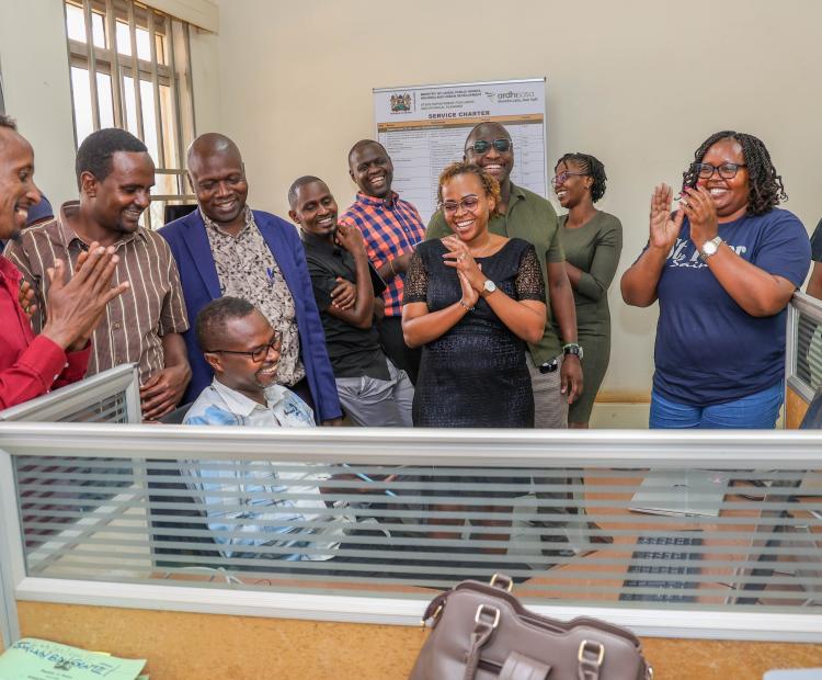 Lands Secretary Sarah Maina and other Government officials look-on as Isiolo Land Registrar John Wanjohi authorizes the first transaction on Ardhisasa in Isiolo County on July 31, 2025